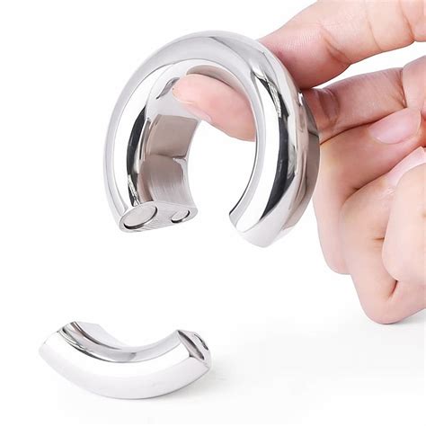 <b>Magnetic Ball Stretcher 15mm</b> - Internal diameter of 35mm - Weight 260g - Pull apart one quarter of the ring, slide in your balls, and shut closed - Two powerful magnets keep the ring firmly closed - Made using body safe nickel-free stainless steel. . Magnetic ball stretcher